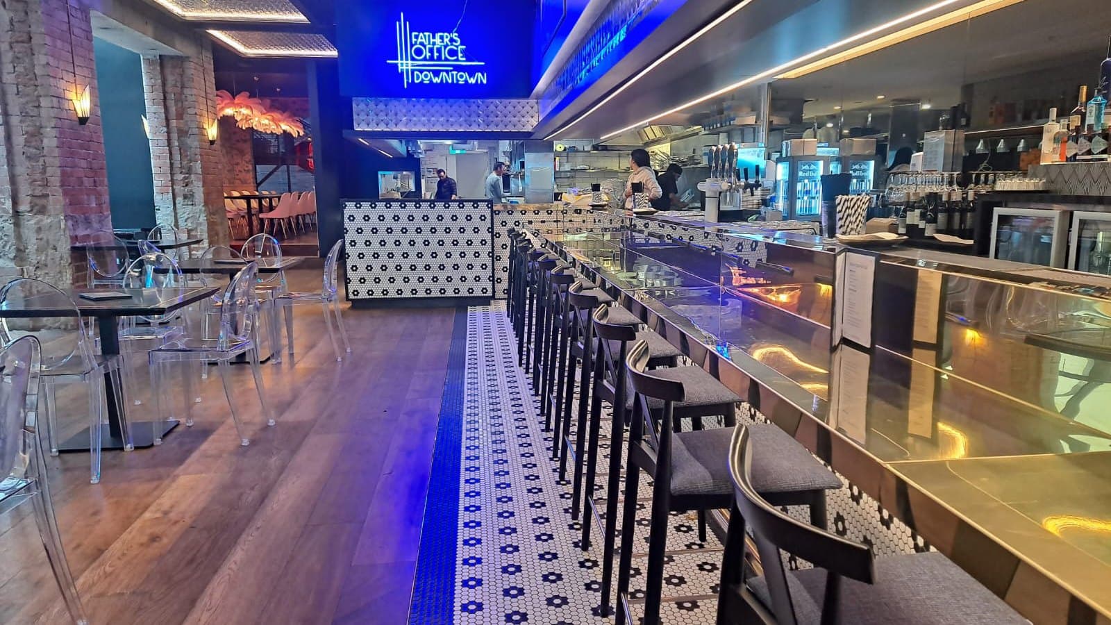 The bar at Father's Office Downtown, lit in blue